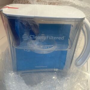 New in box Clearly water pitcher with filter and flushing bag